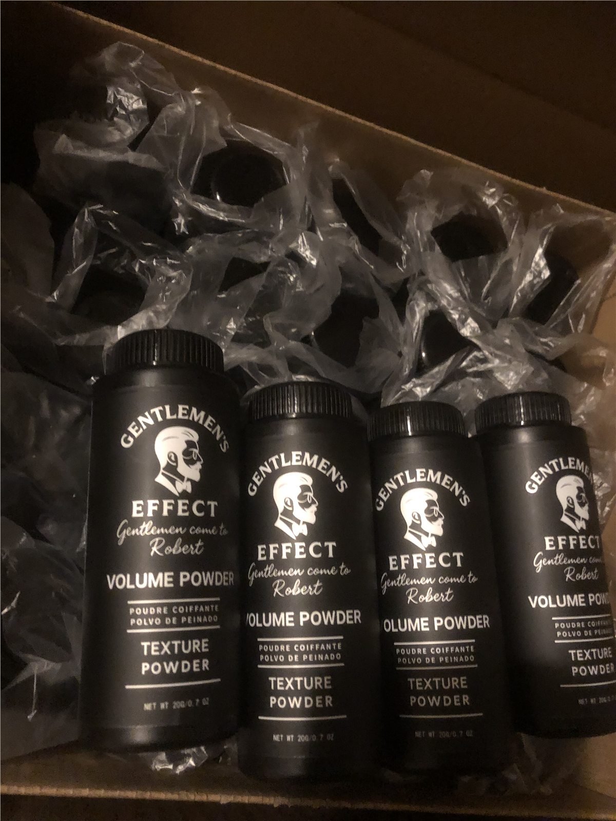 Private label hair powder products prepared for a barbershop customer